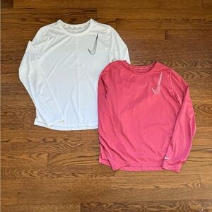 Nike girls Dri-Fit long sleeve tees. Pink and white. Size large